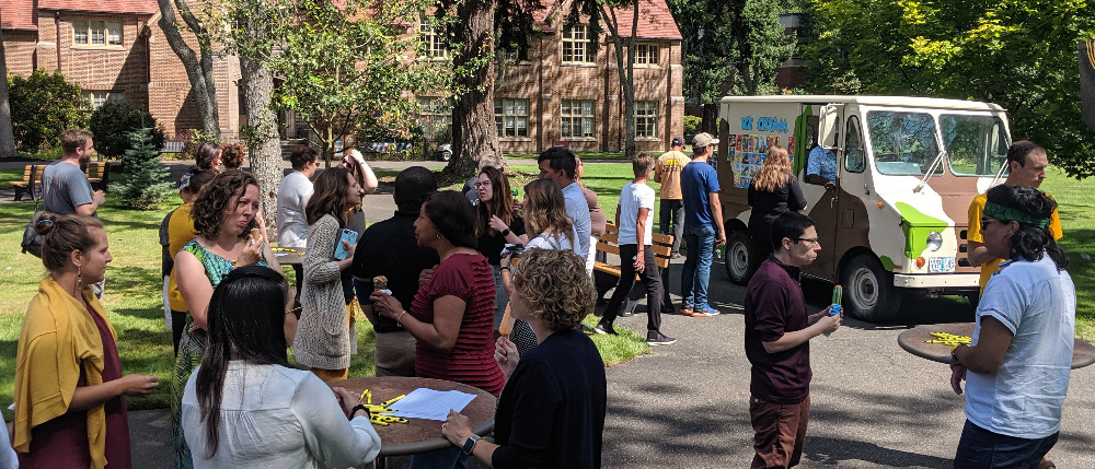 Staff gathered around the ice cream truck.