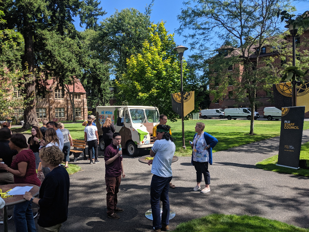 Staff gathered around the ice cream truck.