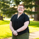 Mara standing on PLU campus