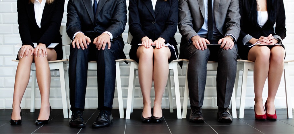 interview copy photo of 5 people waiting to be interviewed