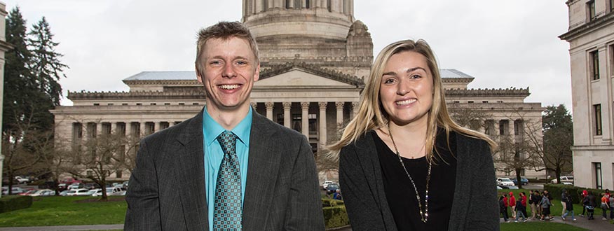 two students in front of capitol