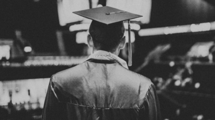 Student in graduation clothes