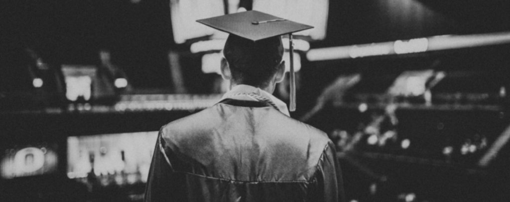 Student in graduation clothes