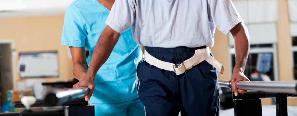 OT pic 1 Physical therapist helping an individual walk