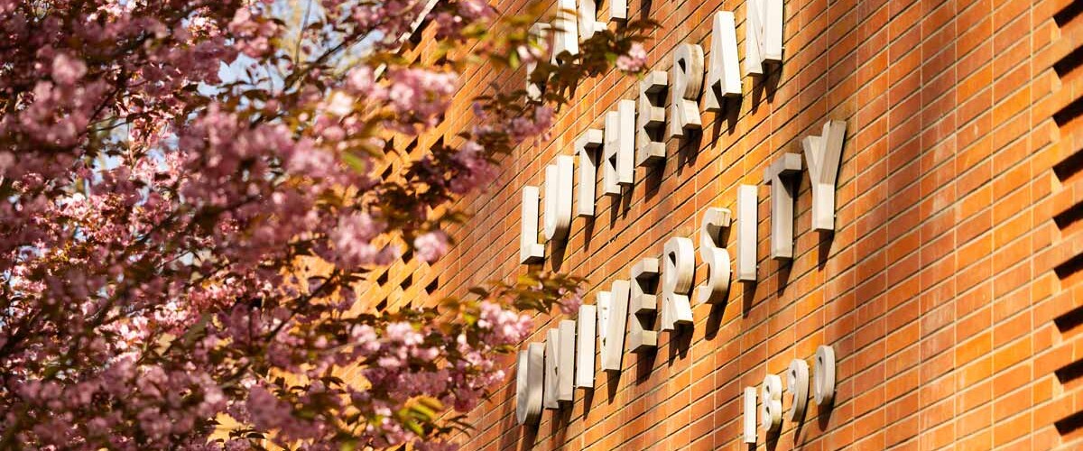Pacific Lutheran University sign on campus.