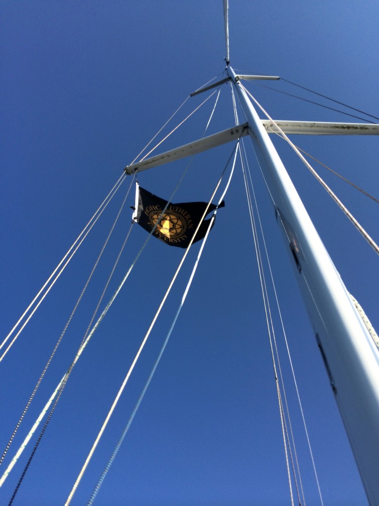PLU flag on a sailboat