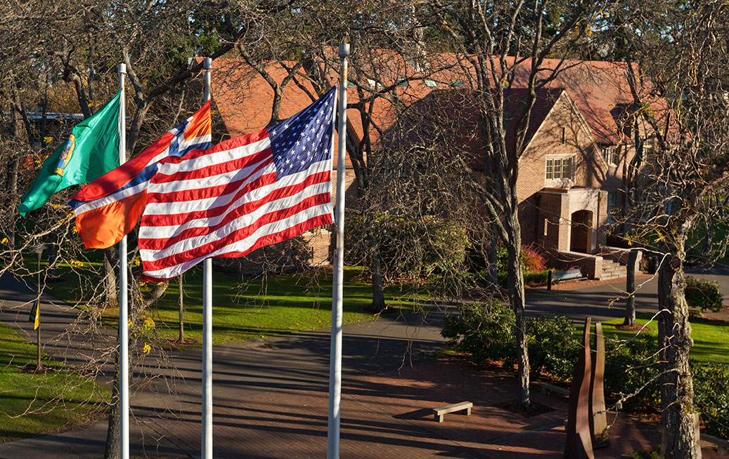 3 Flags blow in the wind on campus