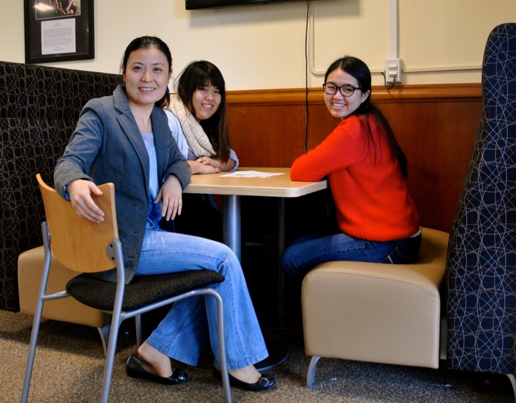 Language Resources Center - three students smiling