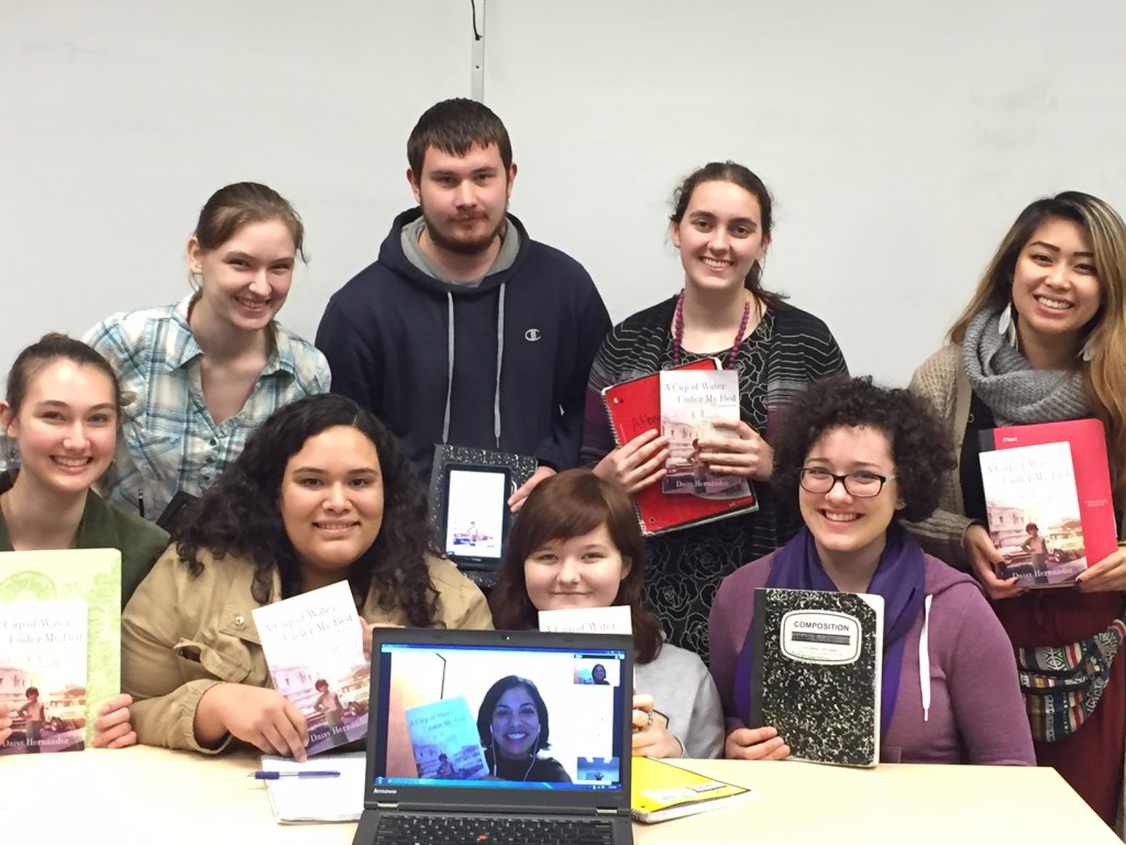 Students post with guest speaker, Daisy Hernandez