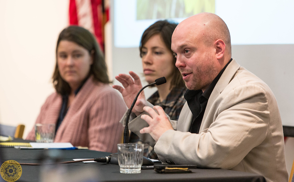 Holly Foster of Zestful Gardens, left, Anika Moran, Mother Earth Farm, center, and Prof. Michael Schleeter, Philosophy, take part on a panel for the Food Symposium sponsored by the Philosophy department of PLU on Monday, Feb. 29, 2016. (Photo: John Froschauer/PLU)