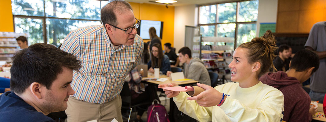 Intro to Business class working on ideas for products they are designing in the Makerspace in Hinderlie Hall at PLU.