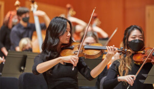 PLU Orchestra students performing.