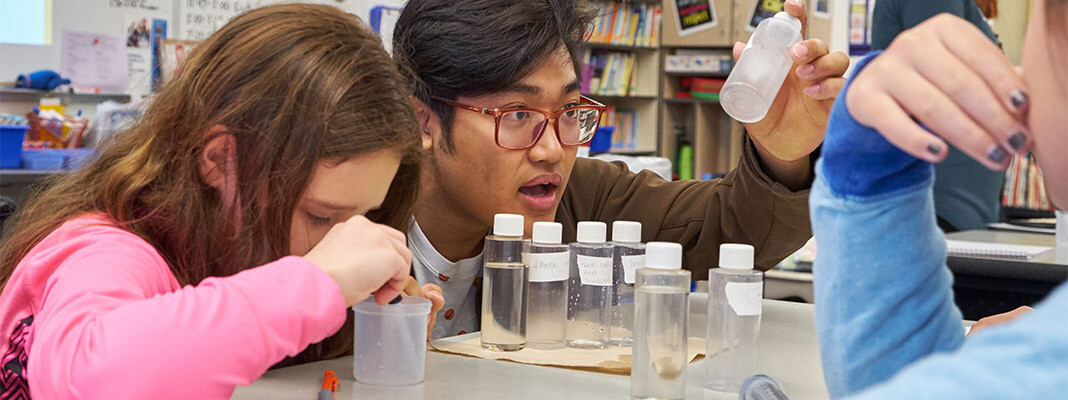 PLU student teaches a science class at an elementary school.