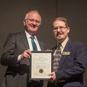 Dr. Tyler Travillian