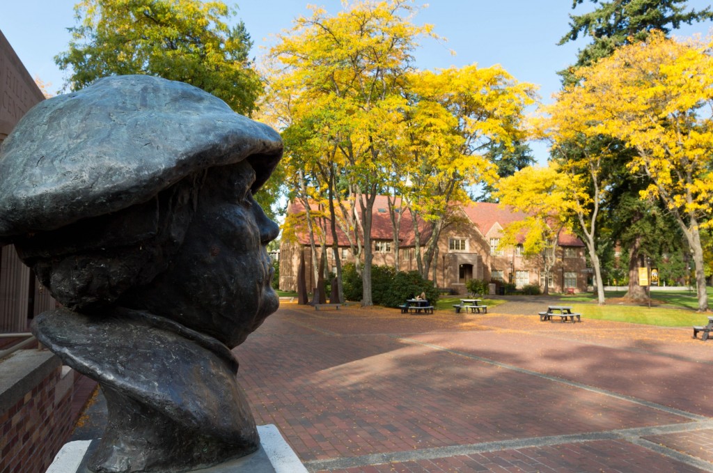 Bust of Martin Luther overlooks Red Square with Xavier in the background at PLU