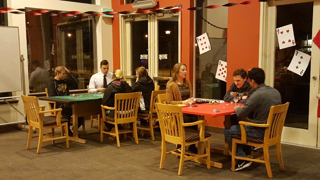 South Hall Casino night, students playing poker