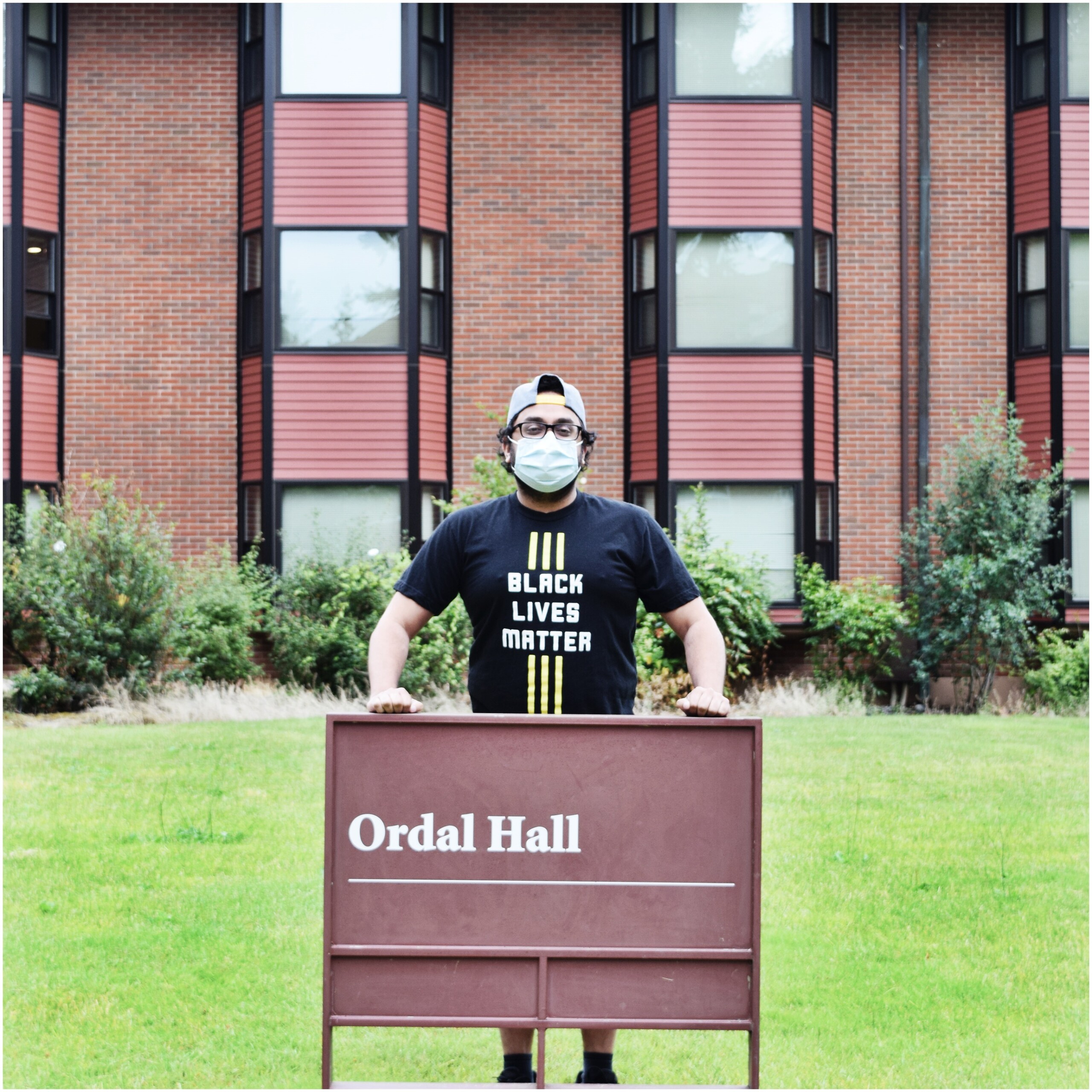 Dhaval Patel in front of Ordal Hall