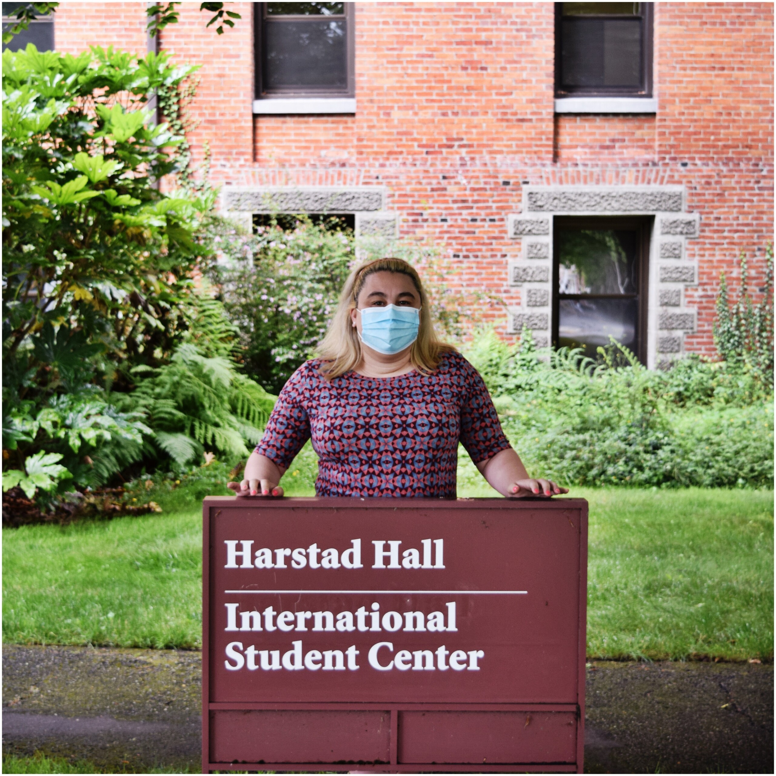 Jess Cotton in front of Harstad Hall