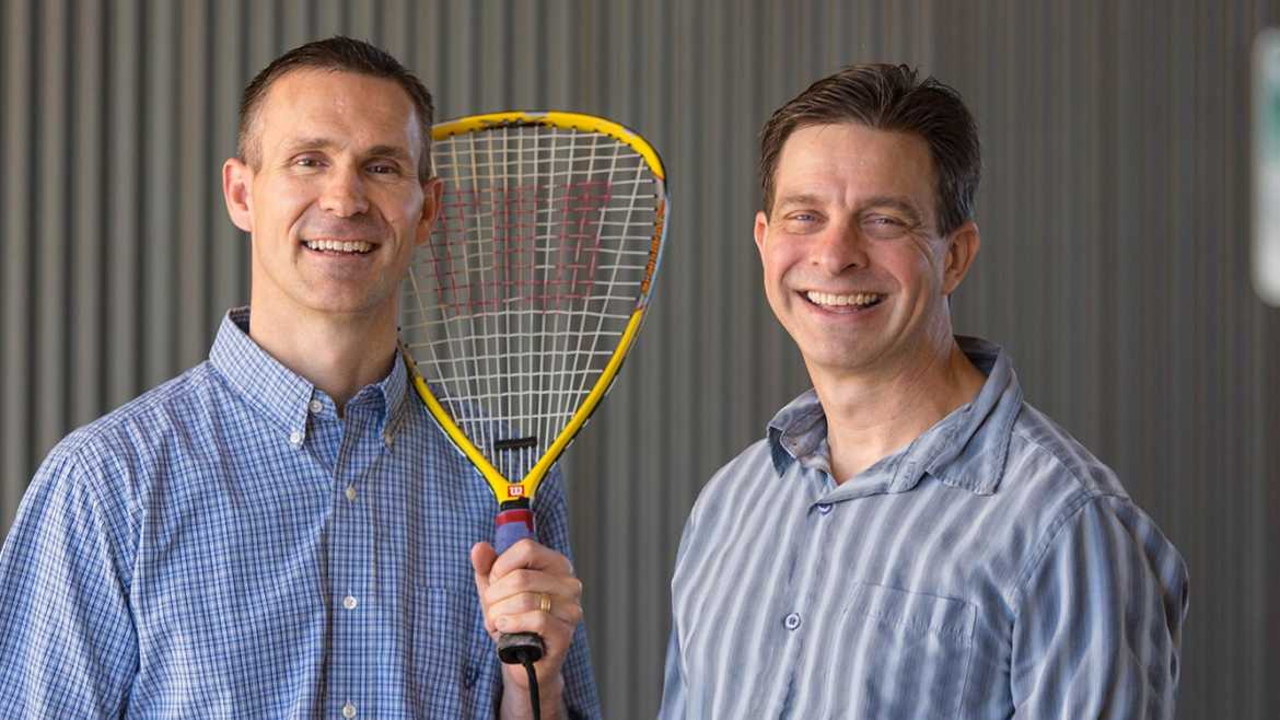 David Ward and Jon Grahe pose outside the Marriage and Family Center at PLU