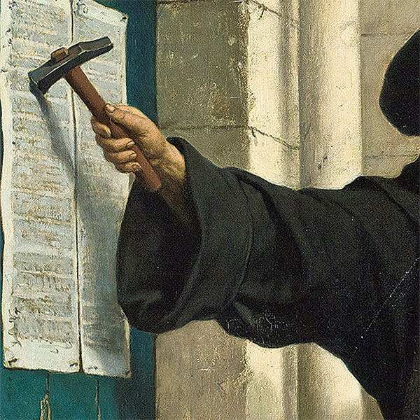 Painting of Martin Luther touching a hammer on the wall