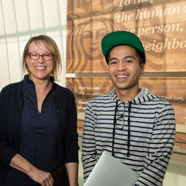 Ann-Marie Kurtz and Hansel Doan standing and smiling together