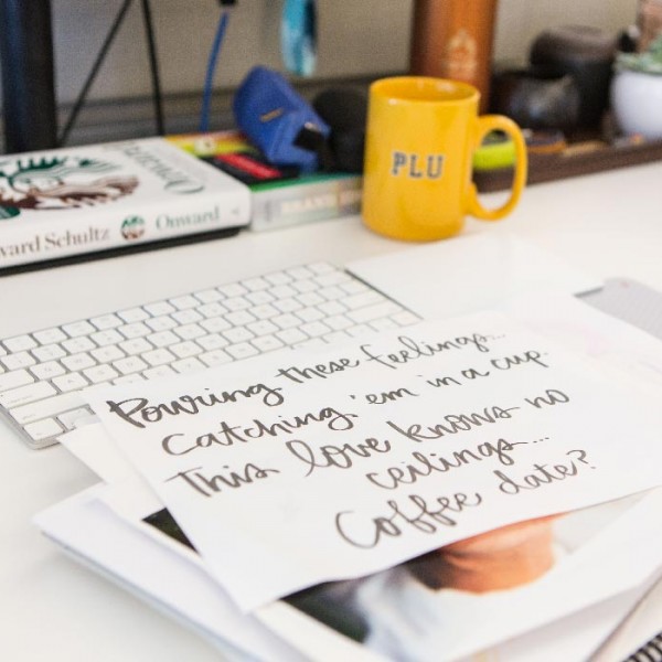 A piece of paper with a saying on it on Hansel Doan's desk