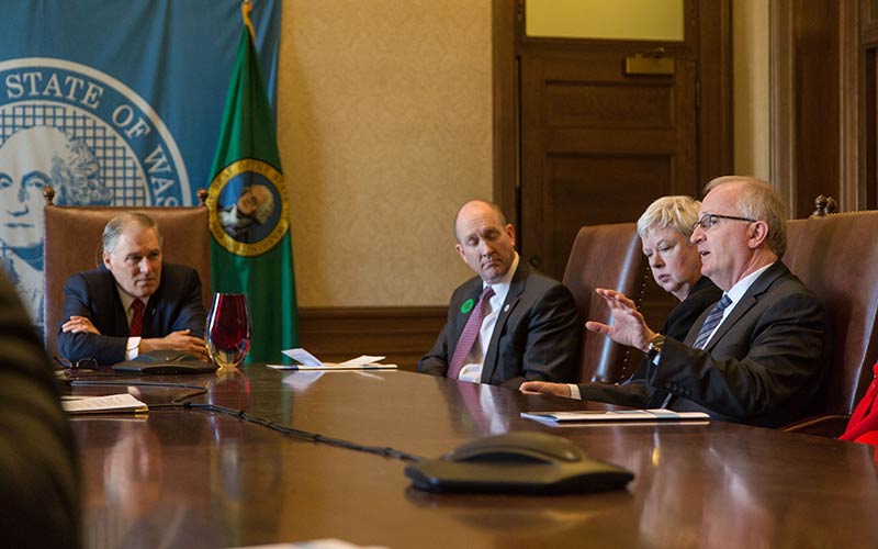 President Allan Belton joins members of the Independent Colleges of Washington in a meeting with Washington Gov. Jay Inslee.