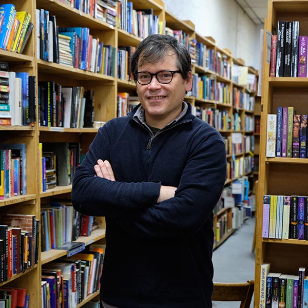 Associate Professor of English Jason Skipper at King's books, Tuesday, June 16, 2020, in Tacoma. (Photo: PLU/John Froschauer)