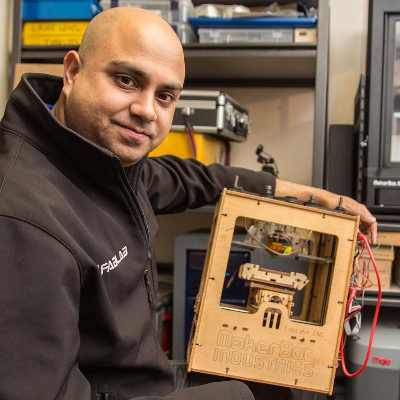 PLU Alumni Billy Davis in the FabLab that he is co-owner of in Tacoma, Monday, March 27, 2017. (Photo: John Froschauer/PLU) PLU Alumni Billy Davis in the FabLab that he is co-owner of in Tacoma, Monday, March 27, 2017. (Photo: John Froschauer/PLU)