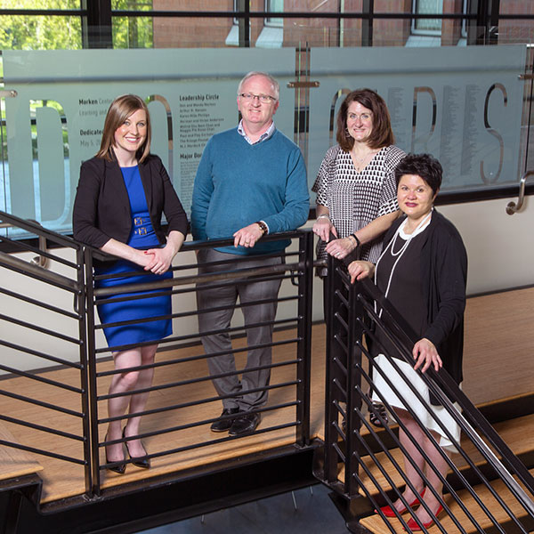 From left to right: Kari Plog ’11, Allan Belton, Laree Winer '15 and Eva Frey ’95