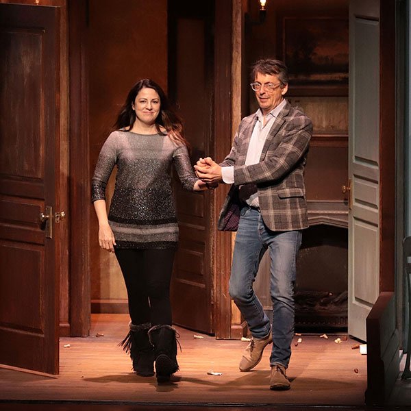 Korine Fujiwara walking onto the stage to the applause of the crowd after her opera, "The Flood"