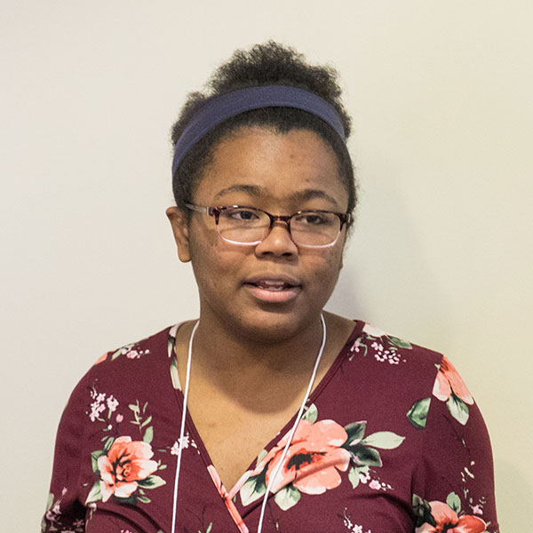 Cynthia Waite '20 - smiling while presenting her research