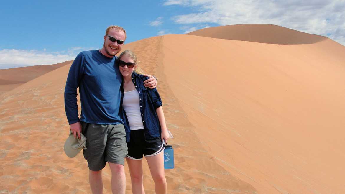 Sam Rise and Allison Small hugging while in Namibia, Africa