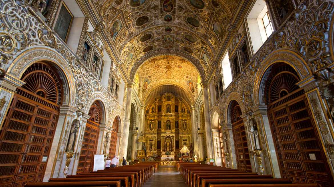 Inside a beautiful gold-colored Church in Oaxaca, Mexico