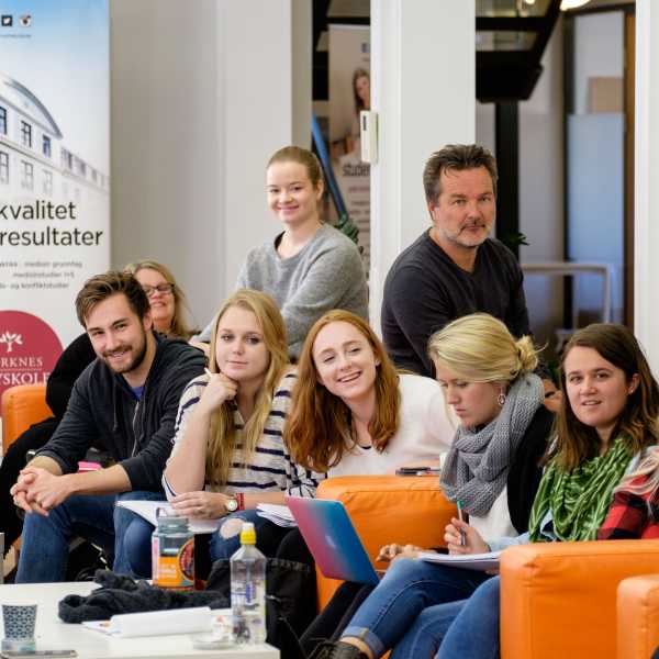 students laughing during brown-bag seminar in oslo