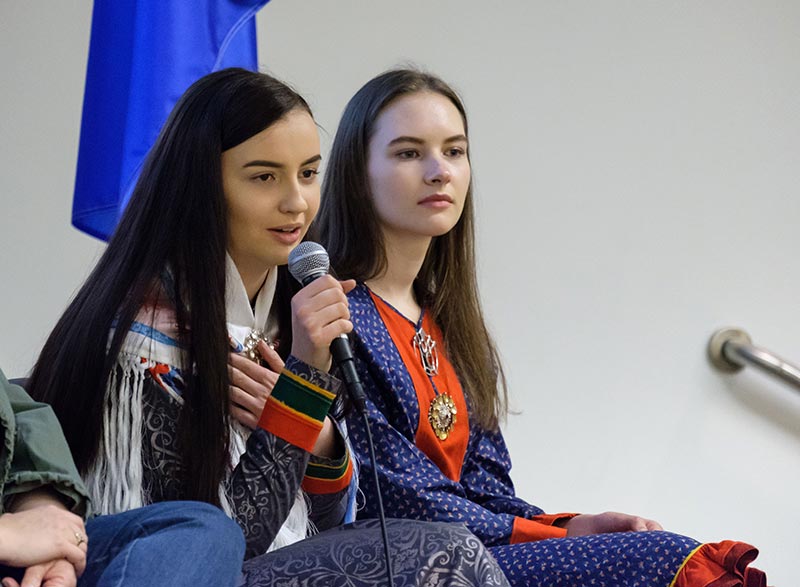 Mathilde Magga '20 (left) and Elle Sina Søerensen '20 speak during a panel event on Sámi National Day in the Scandinavian Cultural Center at PLU on Feb. 6. Both students are wearing their traditional Sámi garb.
