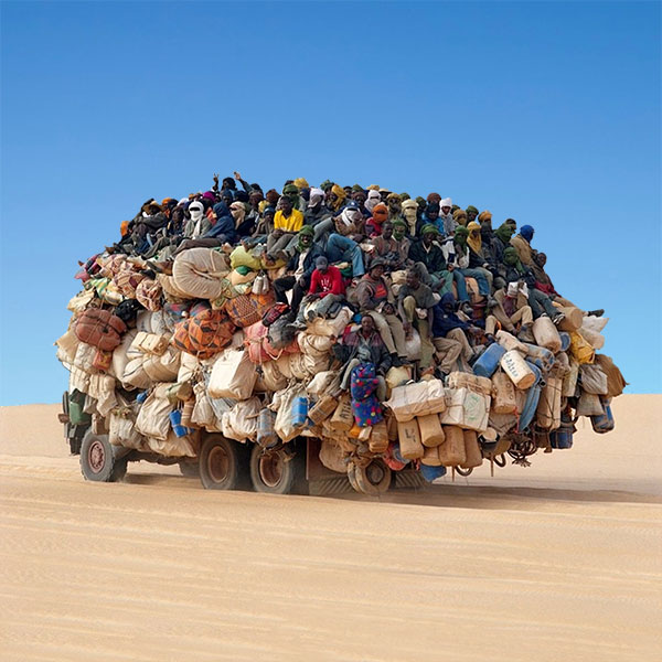 A big truck load of people