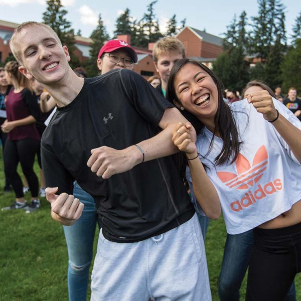 New students participate in get-to-know-you games on Foss Field.