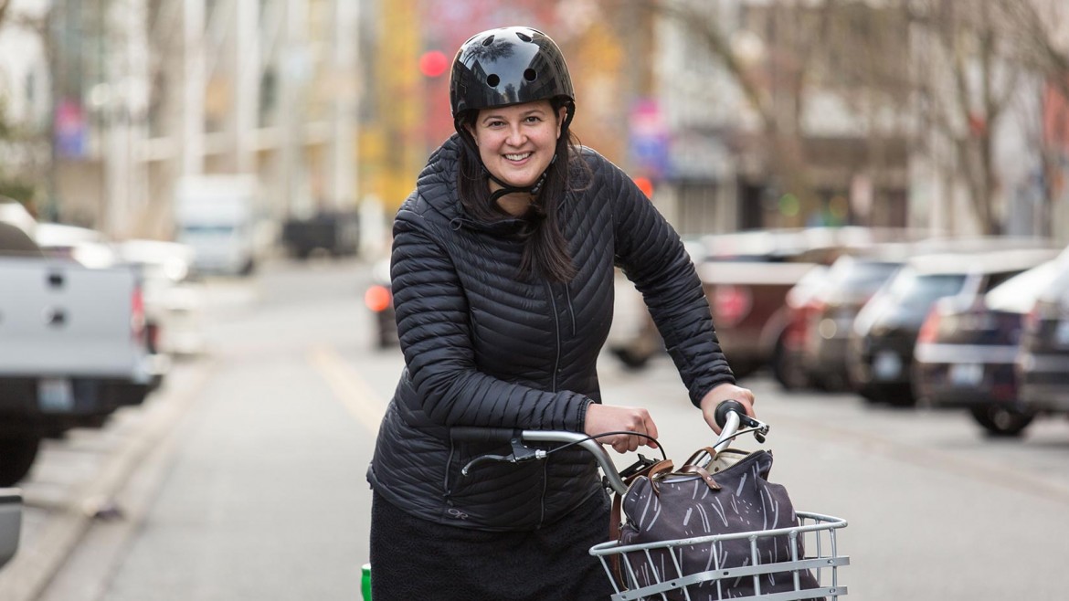 Kristina Walker, Executive Director of Downtown: On 1he Go, rides a lime bike in Downtown Tacoma