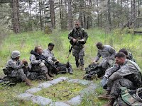 rotc students meeting in the woods