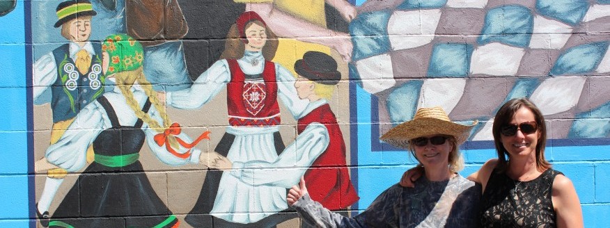 Melody Stepp and Elisabeth Ward in front of the parkland mural