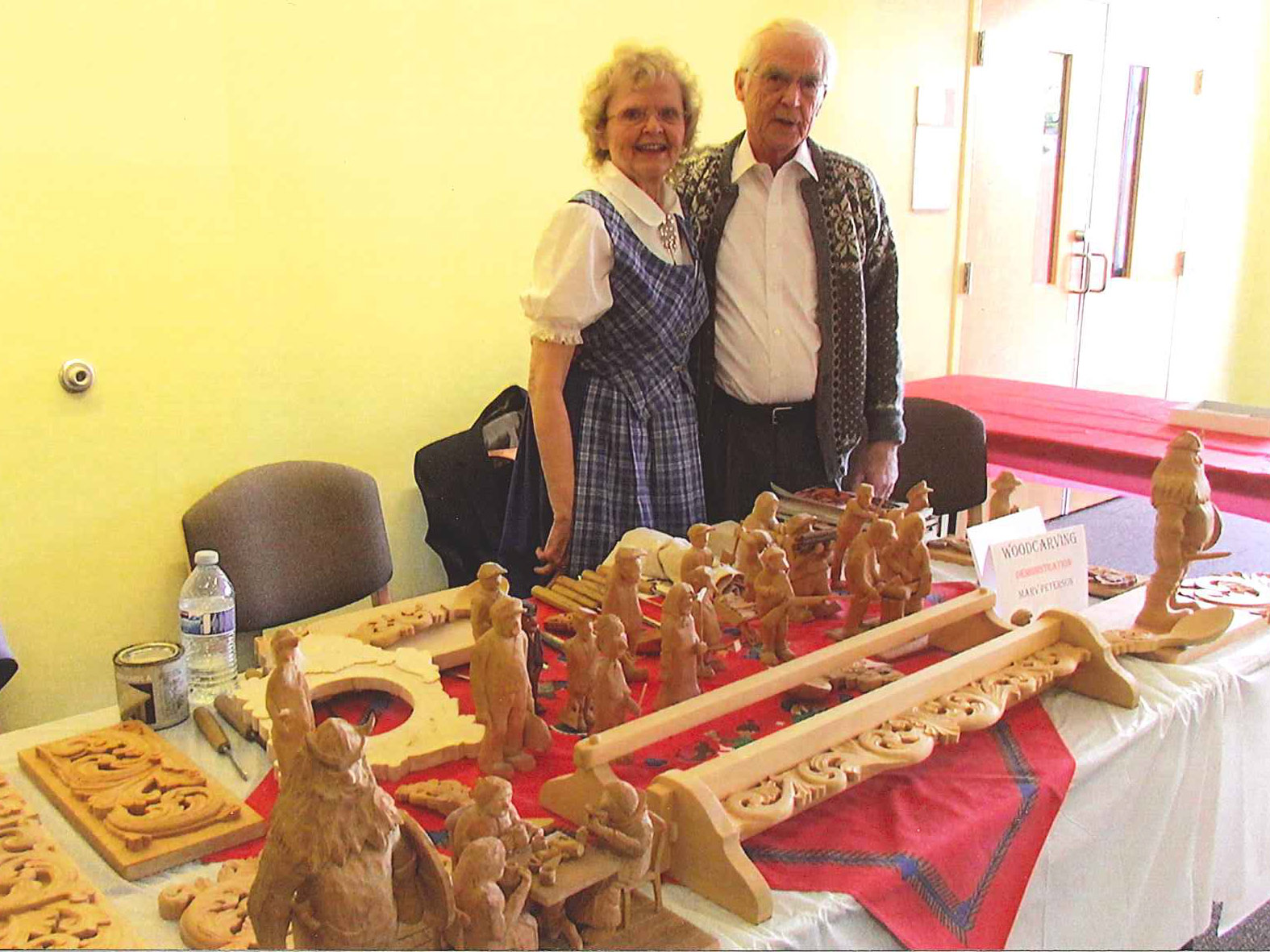 Norwegian Heritage Festival - a couple with their wooden carvings