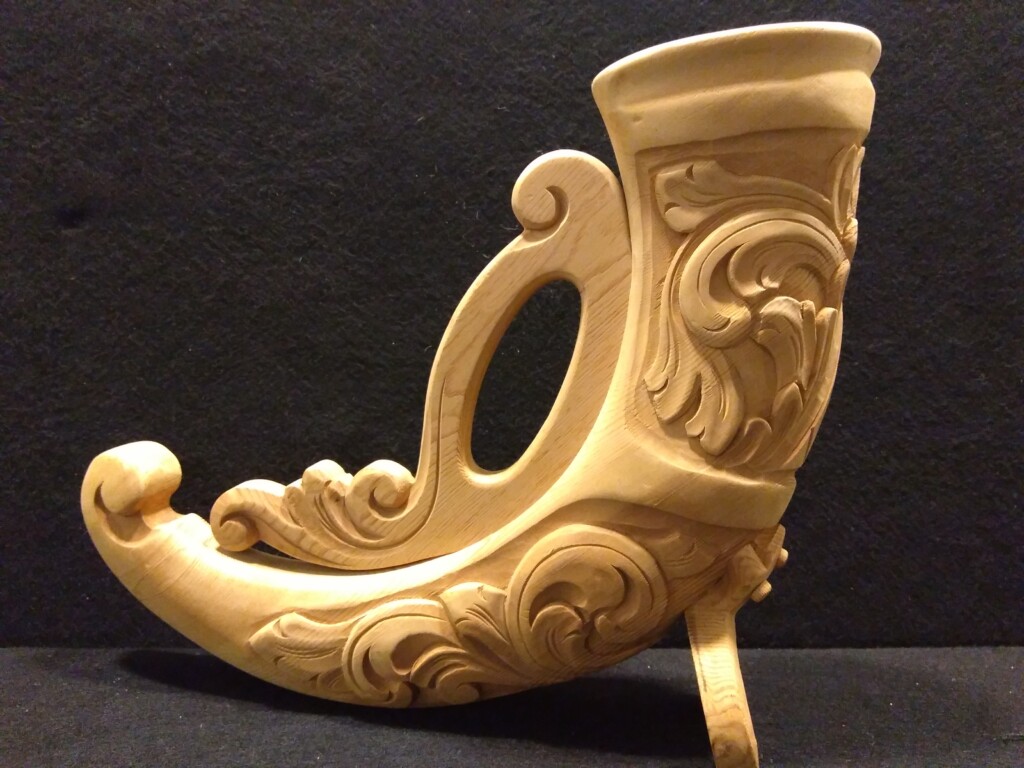 Carved wood drinking horn