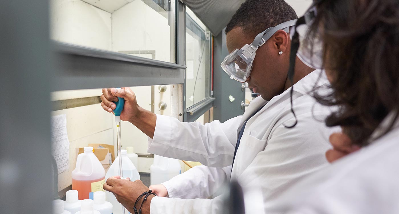 Kenson Jean working in the chemistry lab at PLU, Tuesday, April 16, 2019. Jean is a transfer student from Olympic College. (Photo/John Froschauer)
