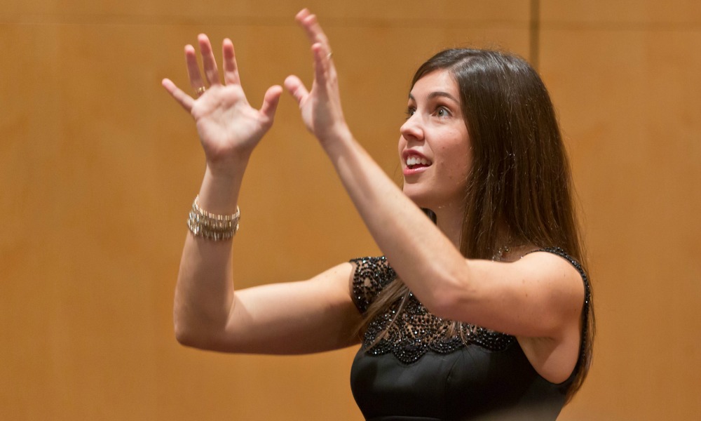 Lauren Whitham conducting the University Singers in Mary Baker Russel Center at PLU on Wednesday, Oct. 8, 2014. (PLU Photo/John Froschauer)