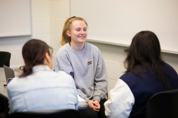 Assistant Professor Ran Winnett leads the SOCW 360 course, Thursday, April 6, 2023, in Hauge at PLU. (PLU Photo / Sy Bean)