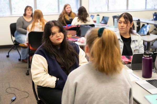 Assistant Professor Ran Winnett leads the SOCW 360 course, Thursday, April 6, 2023, in Hauge at PLU. (PLU Photo / Sy Bean)