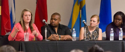 students talking in a panel