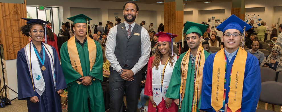 Image: Palmer Scholars H.S. graduates who are PLU bound pose with Jonathan Jackson, Palmer Executive Director