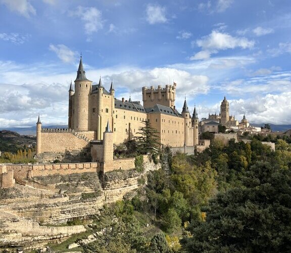 castle on hillside in Spain